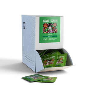 A white and light blue cardboard display box filled with green tea bags, with a few tea bags placed in front on a white background. The front of the box features a green label with Japanese text and an illustration.